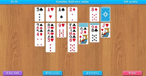 The table in online klondike solitaire has seven columns. The first starts with one card, the second with two cards, and so on to the seventh, which starts with seven cards. The remaining cards are face down in the top left corner. You can click on them to turn over one card at a time. There are four foundations at the top, which start off empty.